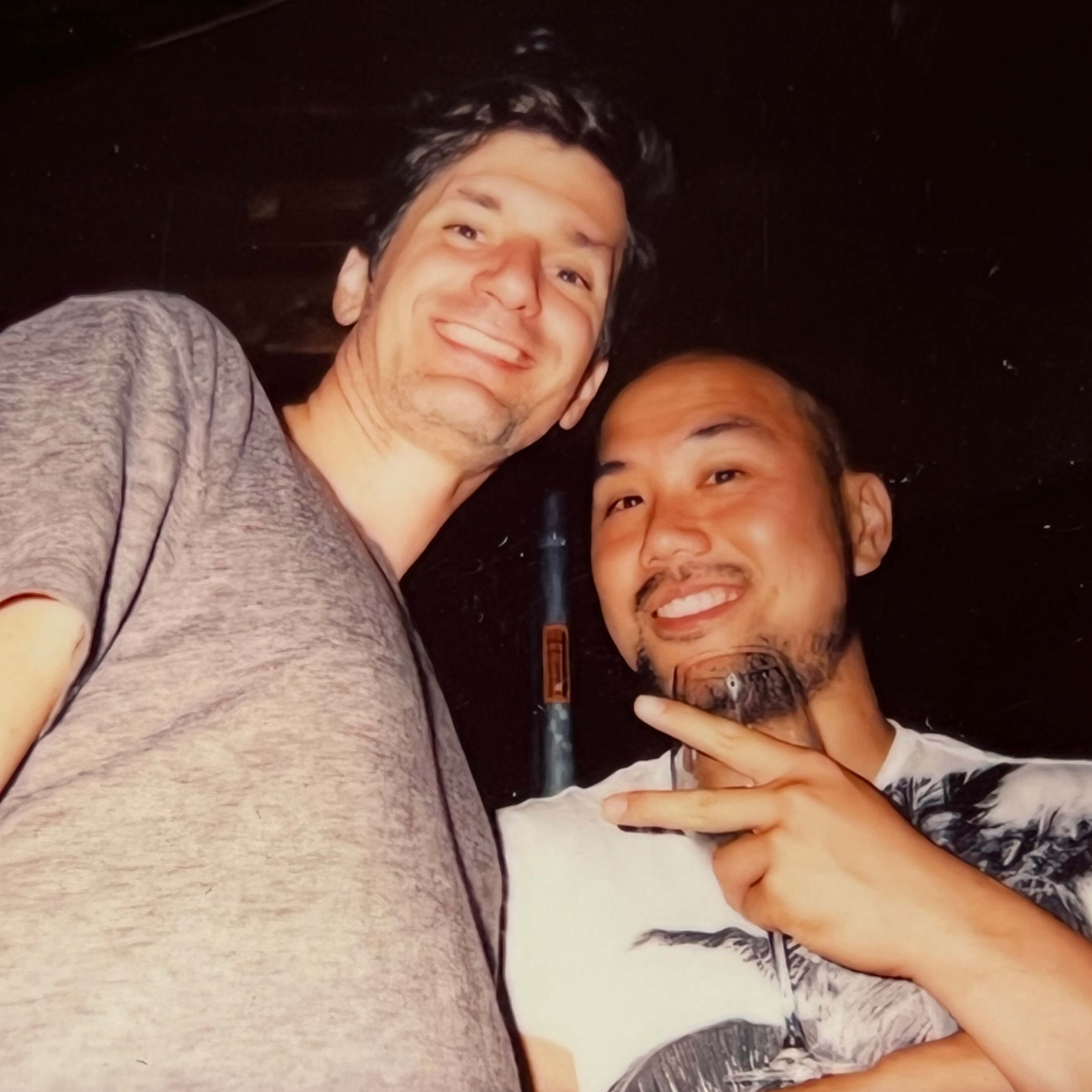 Two Keen employees standing together smiling